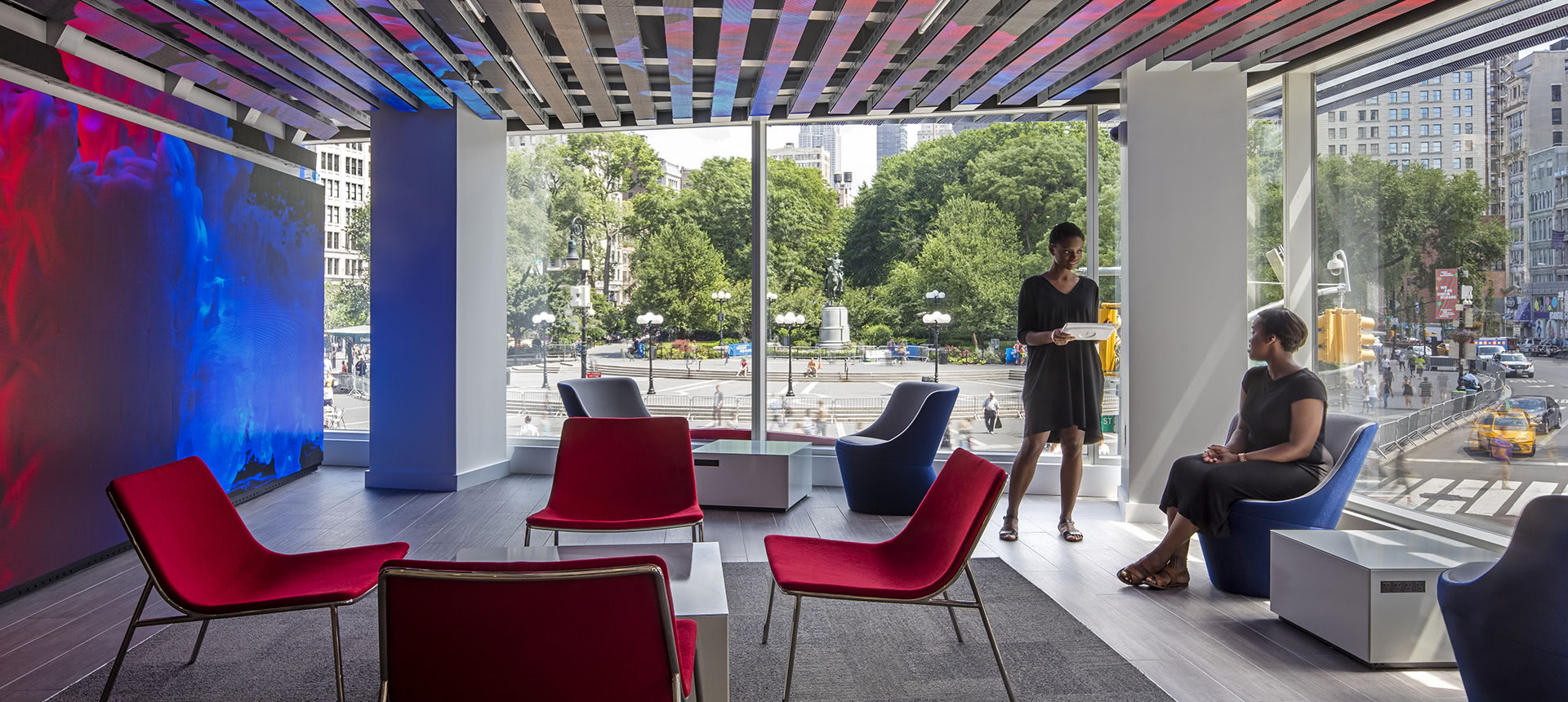 Floor-to-ceiling LED video wall in a flagship lounge